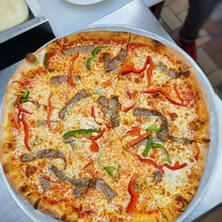 Indulge in Our Cheesesteak